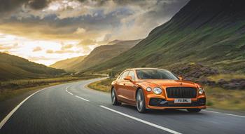 Colour , Orange Image type , Action Angle , Side/Profile Angle , Front Craftsmanship Performance Corporate , Innovation Corporate , Beyond100 Corporate , Company Current Models , New Flying Spur , Flying Spur Speed 